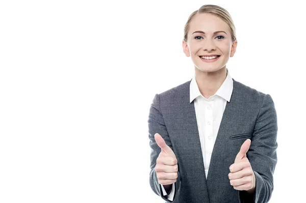 Young businesswoman with thumbs up — Stock Photo, Image