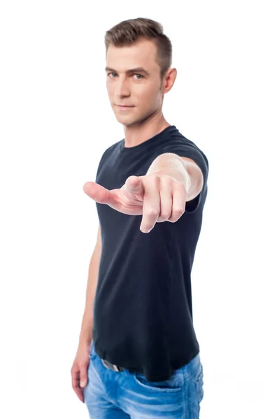 Young guy pointing towards camera — Stock Photo, Image