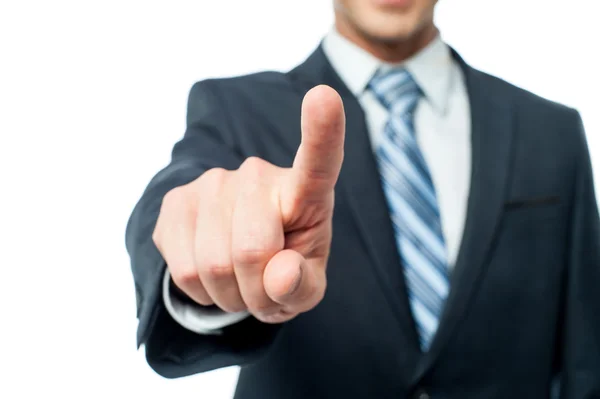 Businessman pointing finger towards camera — Stock Photo, Image