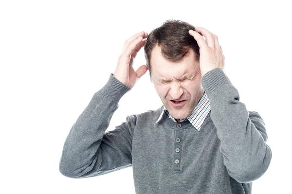 Mann mittleren Alters mit Kopfschmerzen — Stockfoto