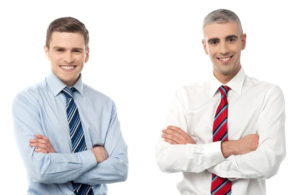 Businessmen posing together with crossed arms — Stock Photo, Image