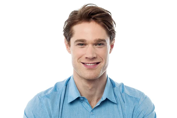 Smiling young man posing to the camera — Stock Photo, Image