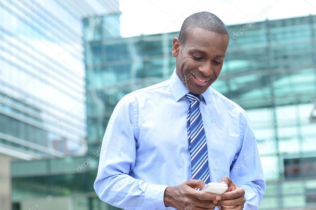 Businessman using mobile phone