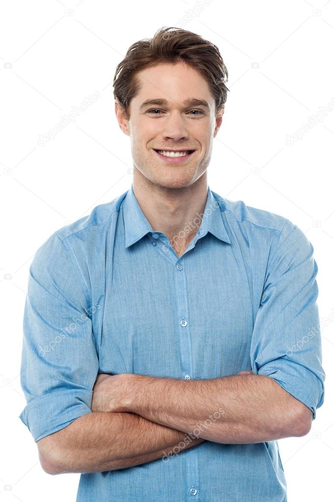 Stylish guy with folded arms