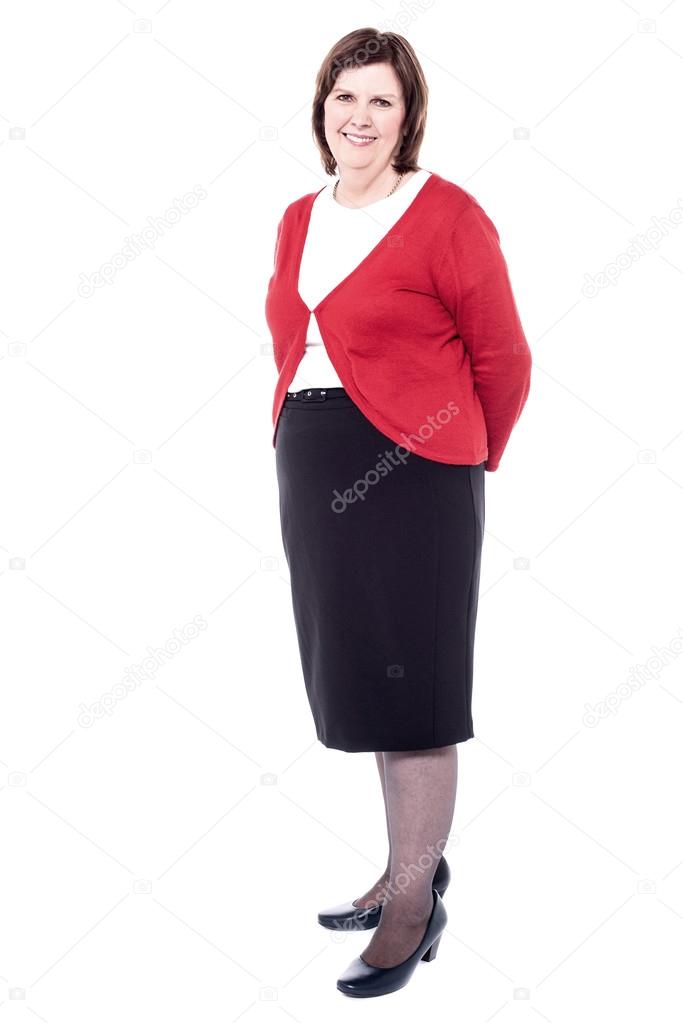 Woman posing sideways to camera