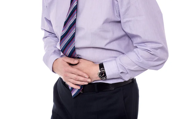 Uomo d'affari che soffre di mal di stomaco — Foto Stock