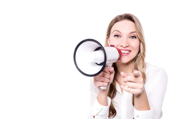 Business woman with a megaphone point towards camera — стоковое фото