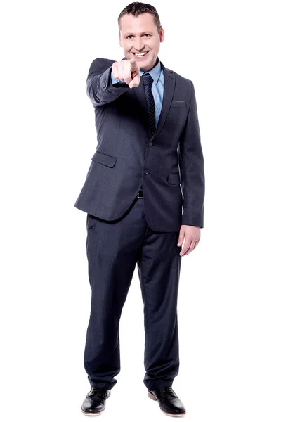 Businessman pointing towards camera — Stock Photo, Image