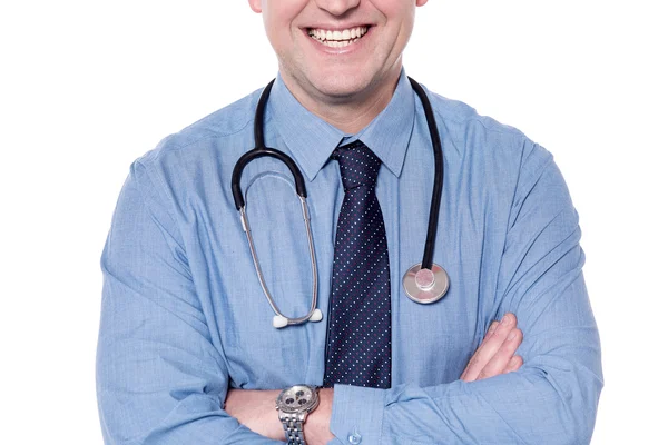 Smiling male doctor with folded arms — Stock Photo, Image