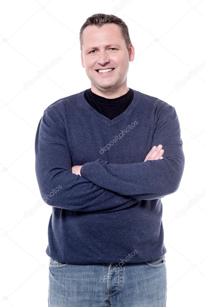 middle aged man with folded arms