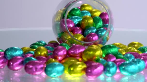 Chocolate Easter Eggs Wrapped Colorful Foil — Stock Video