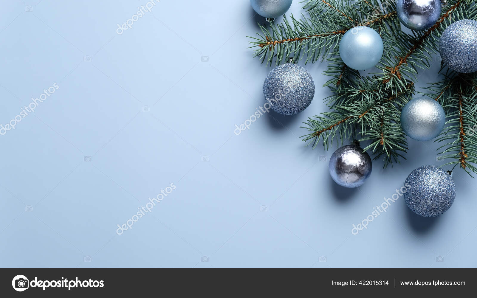 Festive Christmas Decorations with Pine Tree Branches and Silver Balls