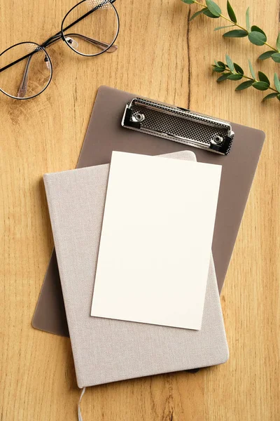 Blank Paper Card Notebook Clipboard Female Glasses Eucalyptus Leaves Wooden — Stock Photo, Image