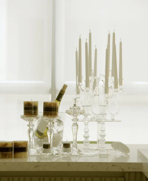 Candles in candle holders on table — Stock Photo, Image