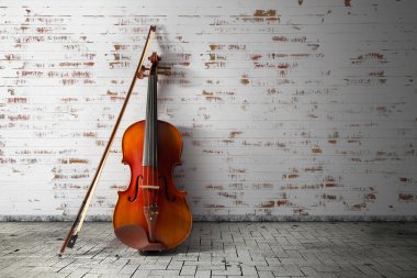 Violin and bow on vintage background clipart