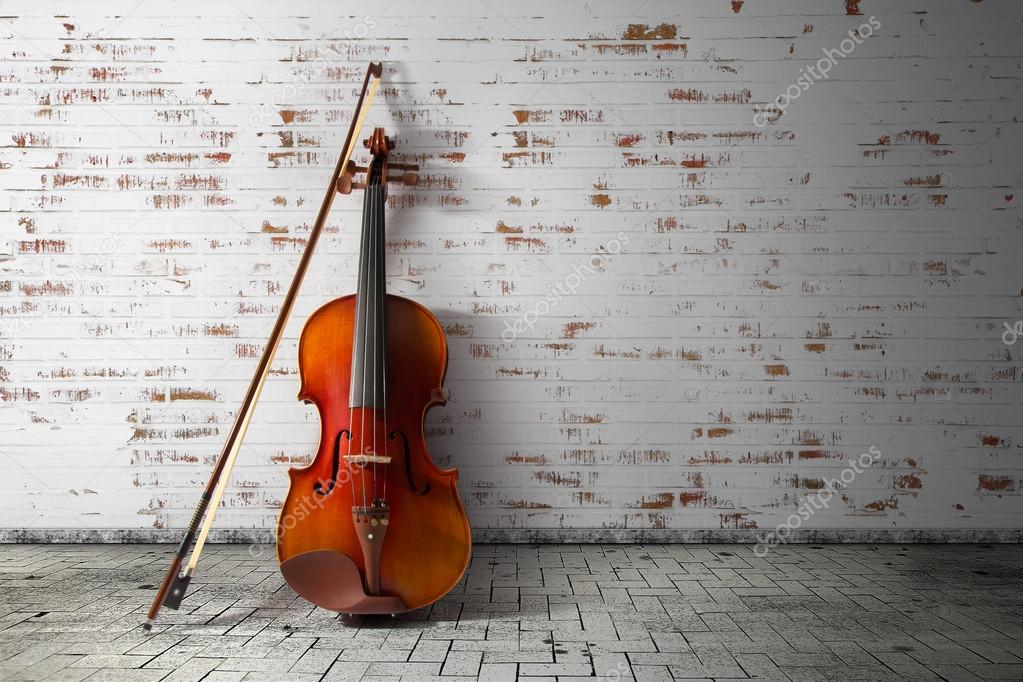 Violin and bow on vintage background