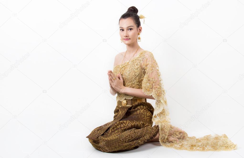 Thai Lady in vintage original Thailand attire Sawasdee action welcome in thai style