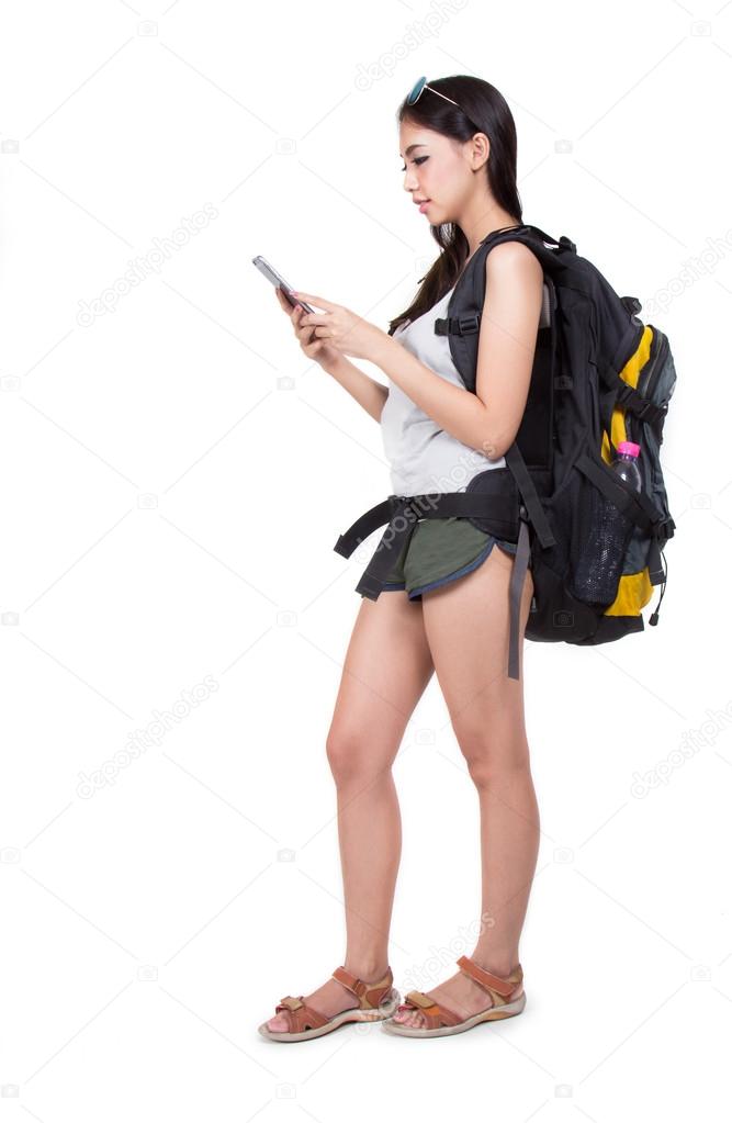 Young woman tourist with backpack