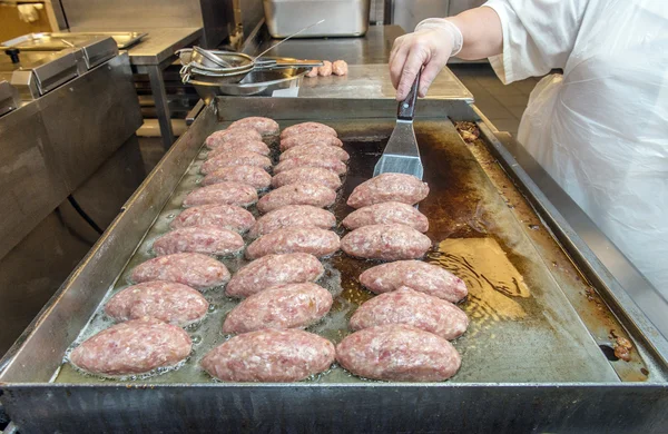 Cooking meat patties — Stock Photo, Image