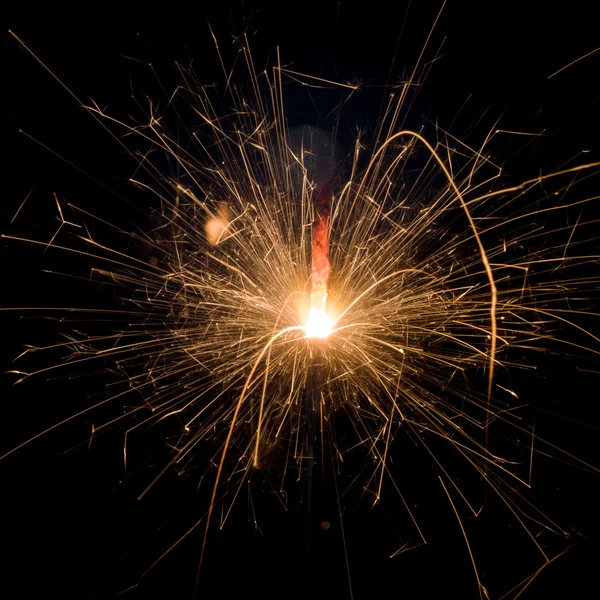 Party sparkler on black — Stock Photo, Image