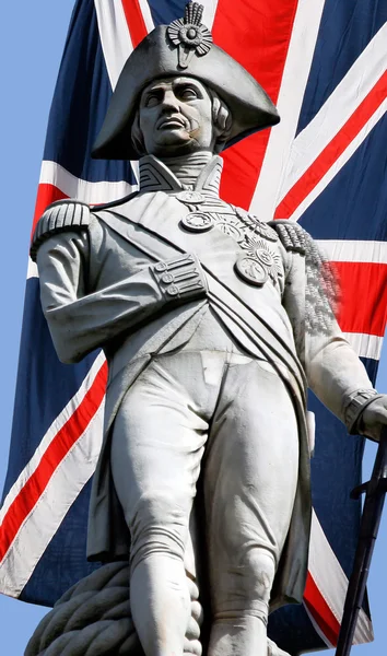 Estátua de Nelson sobre Union Jack — Fotografia de Stock