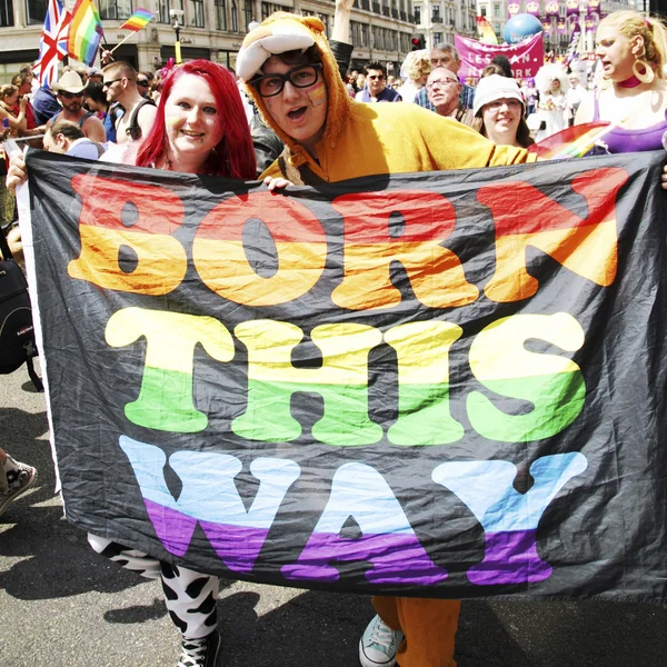 Folk deltager i Londons Gay Pride - Stock-foto