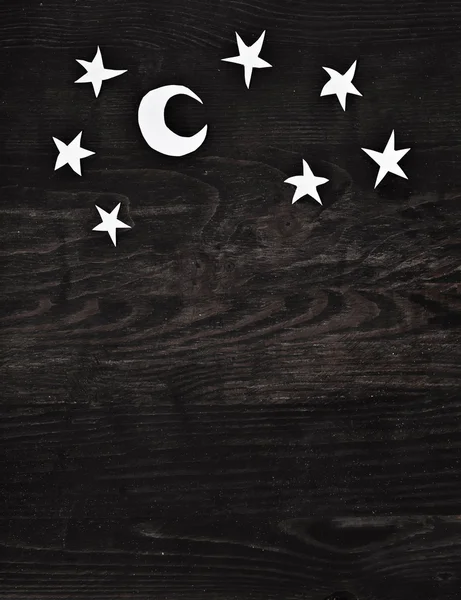 Noel kağıt süslemeleri koyu ahşap arka plan üzerinde