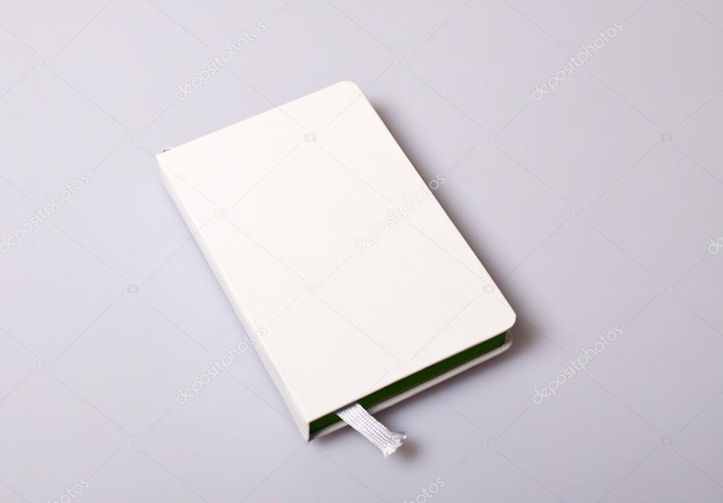 Notepad blank cover on white table