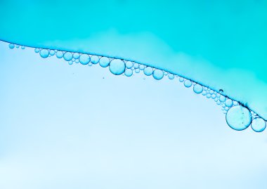 Petrol kabarcıklar mavi arka plan soyut