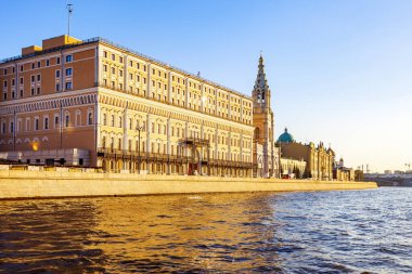 The bell tower of the ancient Church of Sofia on the Sofia Embankment in Moscow on a sunny summer evening from the water of the Moskva River - Moscow, Russia, July 2021