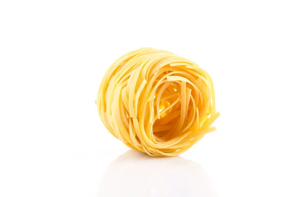 Fettuccine pasta nest — Stock Photo, Image