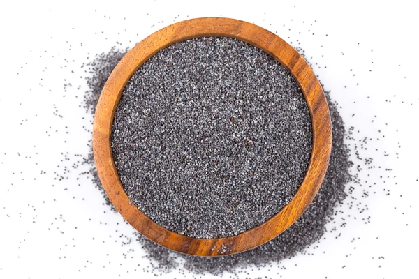 Poppy seeds in a wooden bowl — Stock Photo, Image