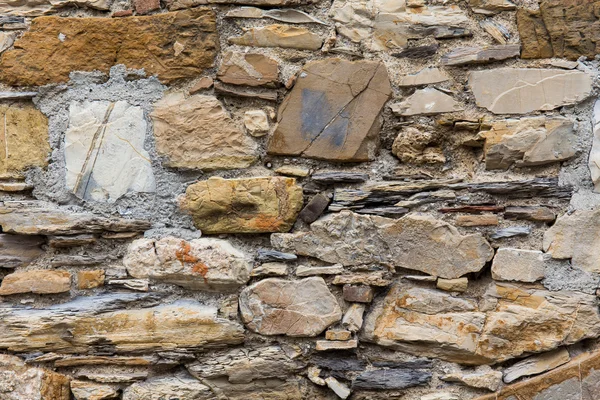 Muur van stenen als een structuur — Stockfoto