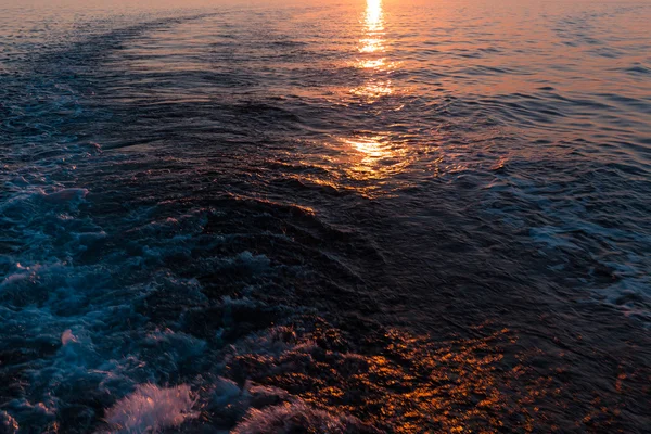 Sea sunset with ship trace — Stock Photo, Image