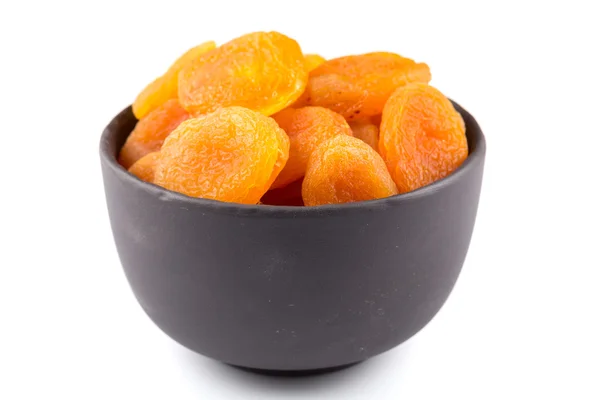 Getrocknete Aprikosen auf weißem Hintergrund — Stockfoto