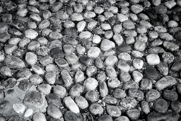 Runde Steine im Boden — Stockfoto