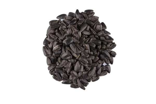 Heap of black sunflower seeds — Stock Photo, Image