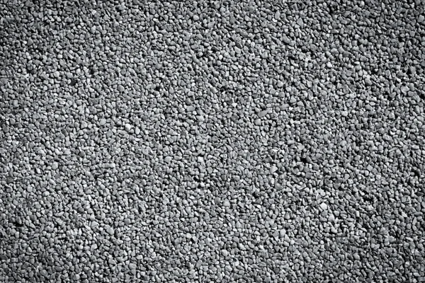 Pequeñas piedras textura de pared — Foto de Stock