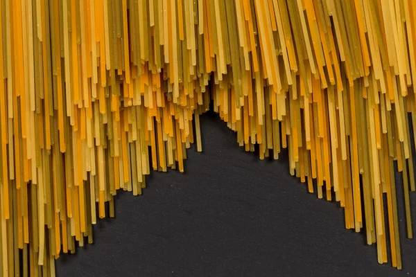 Bunch of various raw italian pasta — Stock Photo, Image