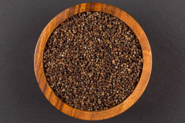 Decorticated cardamom seeds in a bowl — Stock Photo, Image