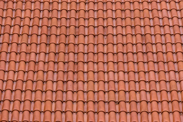 Närbild av den röda lera takpannor — Stockfoto