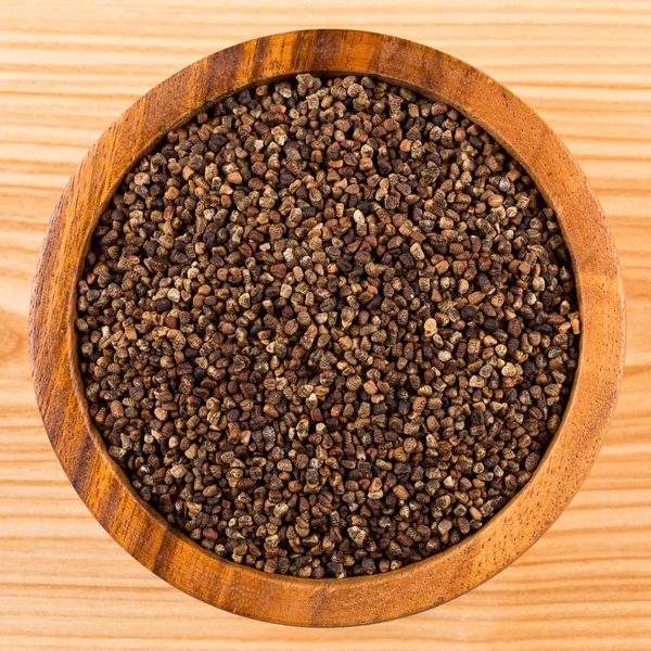 Decorticated cardamom seeds in a bowl — Stock Photo, Image