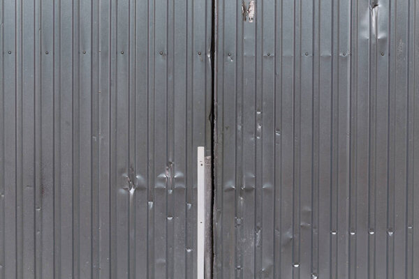 Grunge metal garage door fence dark for texture background