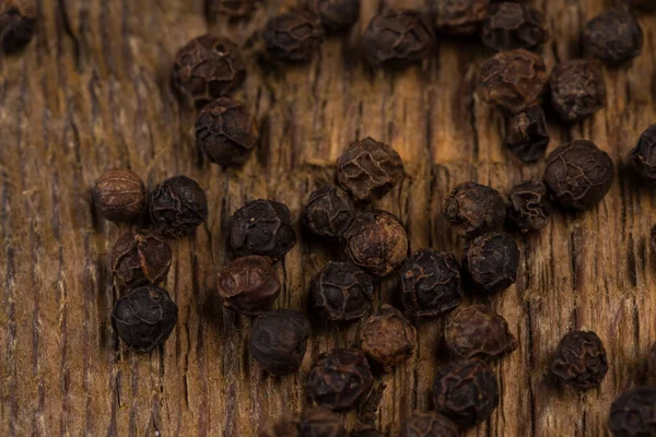 Black Pepper Wood Background Table — Stock Photo, Image