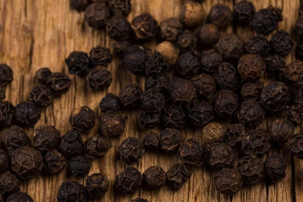 Black Pepper Wood Background Table — Stock Photo, Image