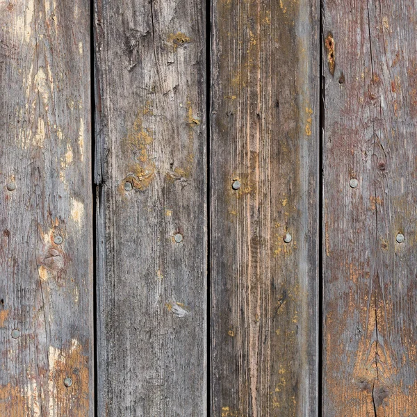 Fondo de madera con madera envejecida y clavos oxidados — Foto de Stock