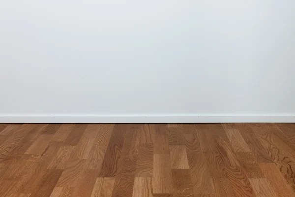 Üres fehér fal és fából készült padló — Stock Fotó