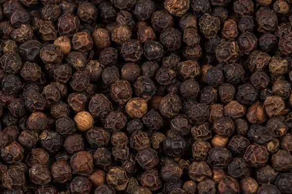 Black pepper zoomed in on — Stockfoto