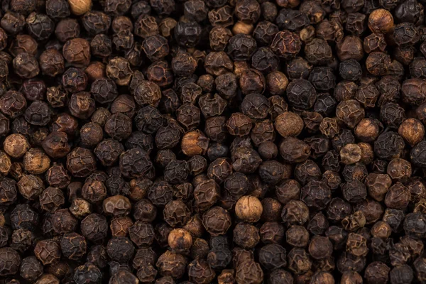 Black pepper zoomed in on — Stock Photo, Image