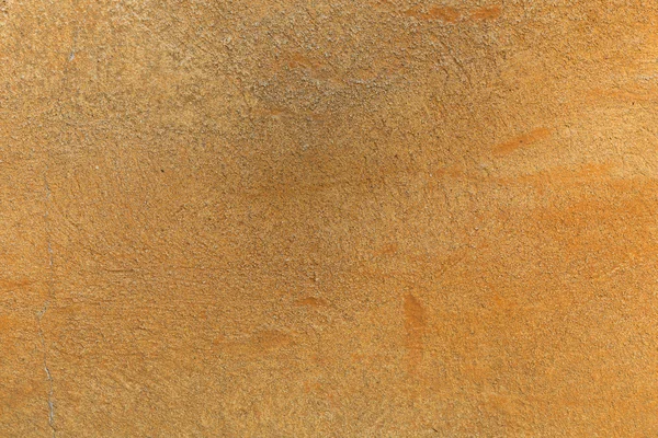 Текстура оранжевой бетонной стены — стоковое фото